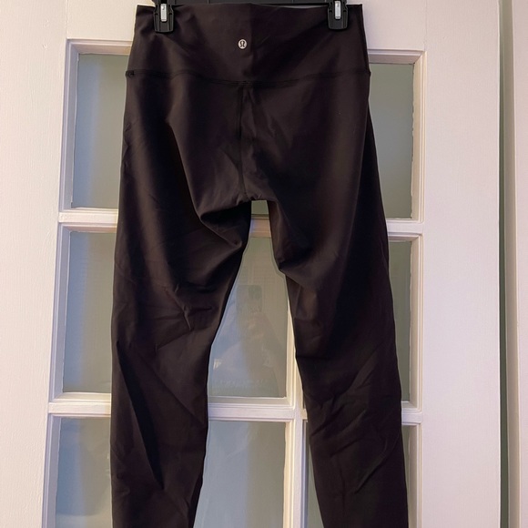 LULULEMON black 25” inseam Wunder Under leggings. Smoke free home. - Picture 2 of 3